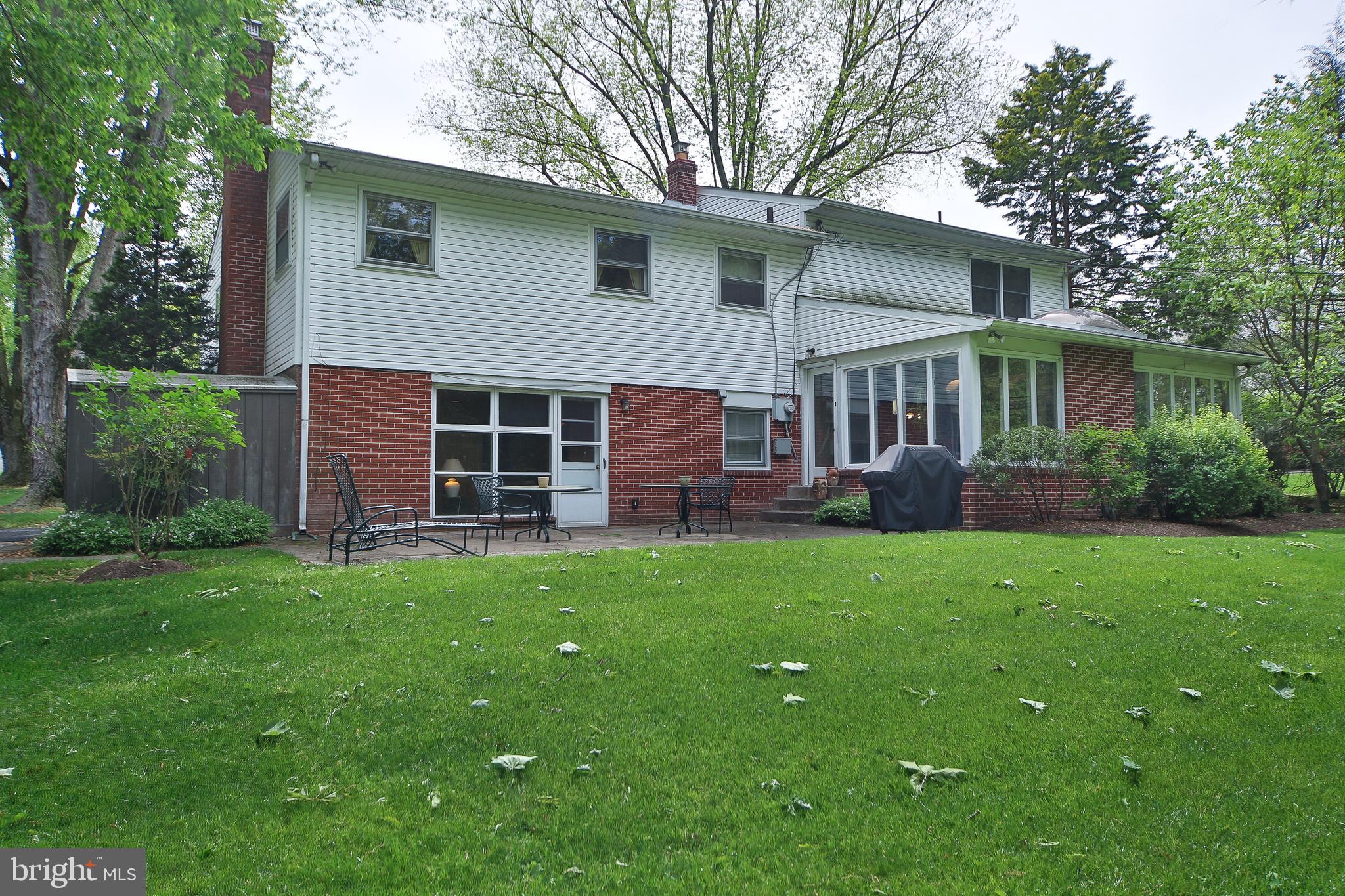 459 Wingate Road Huntingdon Valley, PA 19006 - Photo 28 of 31 a view of an house with backyard space and garden
