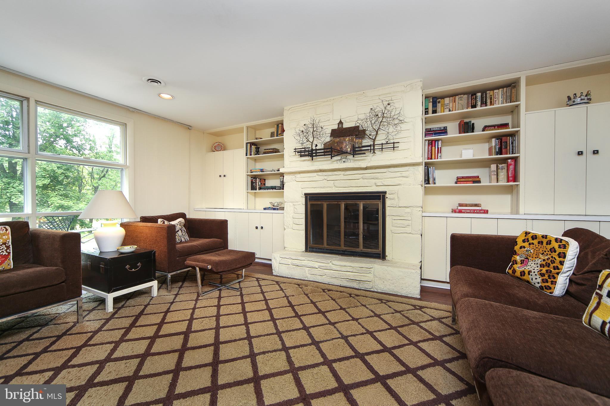 459 Wingate Road Huntingdon Valley, PA 19006 - Photo 7 of 31 a living room with furniture and a fireplace