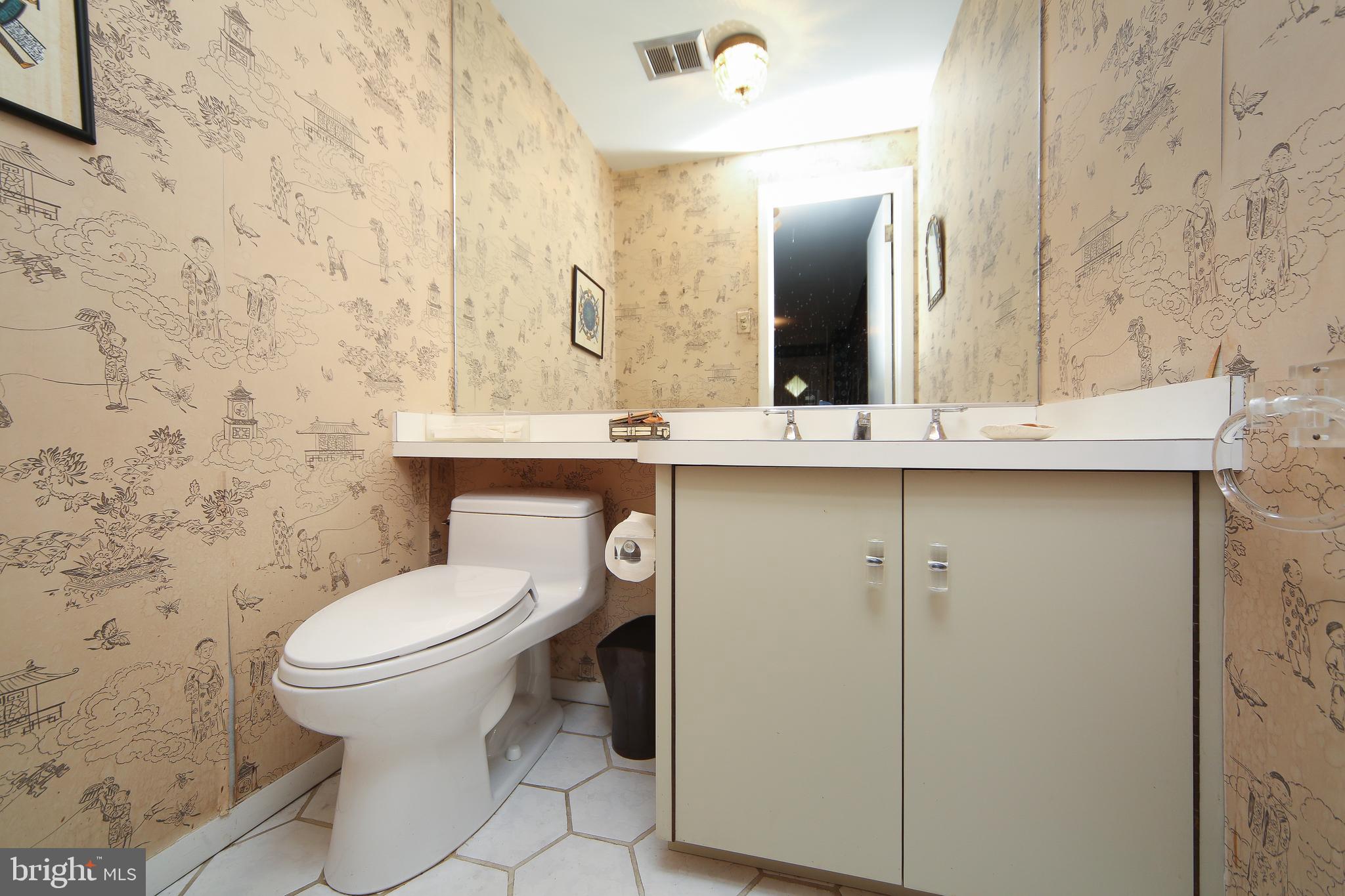 459 Wingate Road Huntingdon Valley, PA 19006 - Photo 9 of 31 a bathroom with a sink and a toilet