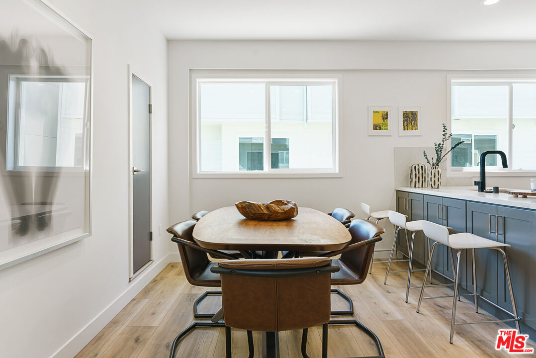 14652 West Sara Lane Panorama City, CA 91402 - Photo 11 of 33 a view of a dining room with furniture window and outside view