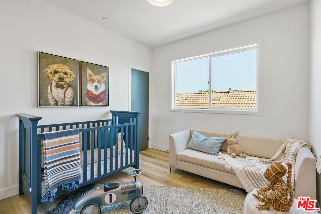 14652 West Sara Lane Panorama City, CA 91402 - Photo 22 of 33 a living room with furniture and a window