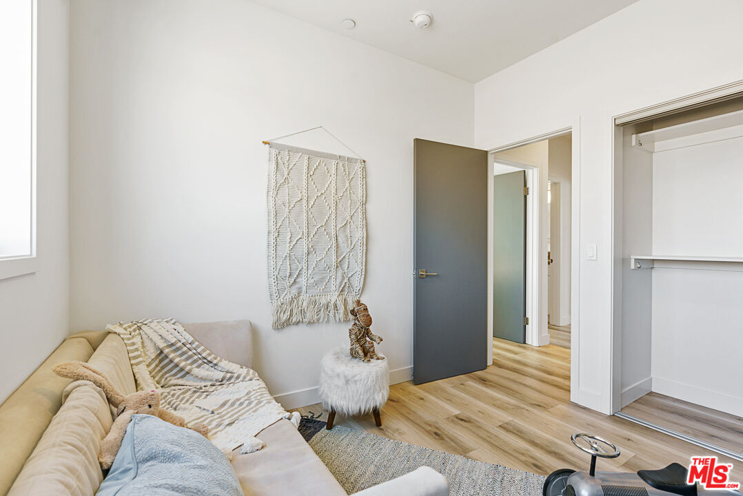 14652 West Sara Lane Panorama City, CA 91402 - Photo 23 of 33 a bedroom with a bed and a window