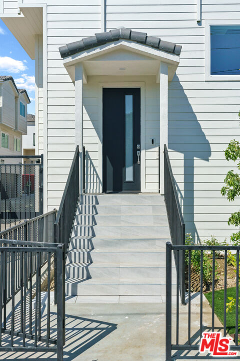 14652 West Sara Lane Panorama City, CA 91402 - Photo 3 of 33 a view of entryway with wooden floor