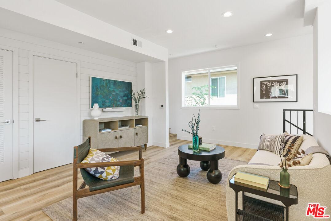 14652 West Sara Lane Panorama City, CA 91402 - Photo 7 of 33 a living room with furniture and a potted plant