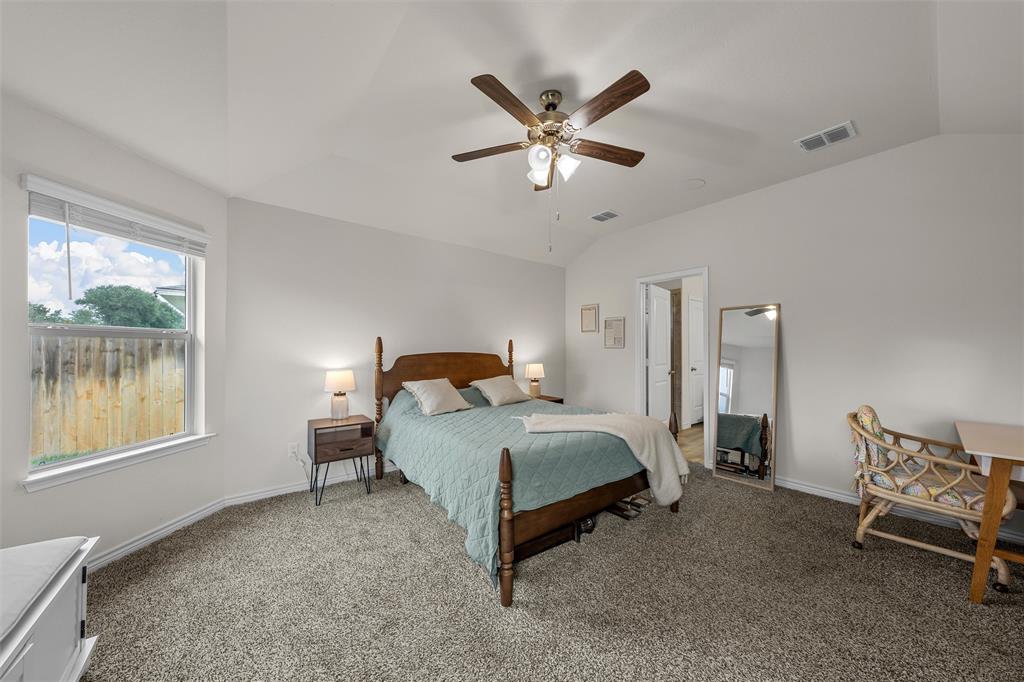 10712 Peperak Court Waco, TX 76708 - Photo 13 of 25 a bedroom with a bed and a window