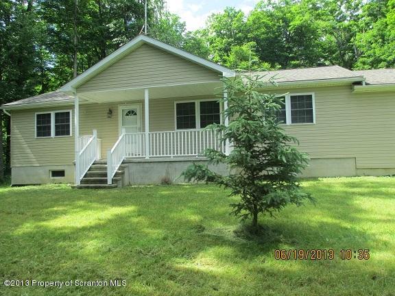 4270 Haas Pond Road Moscow, PA 18444 - Photo 15 of 15 a view of a house with a backyard