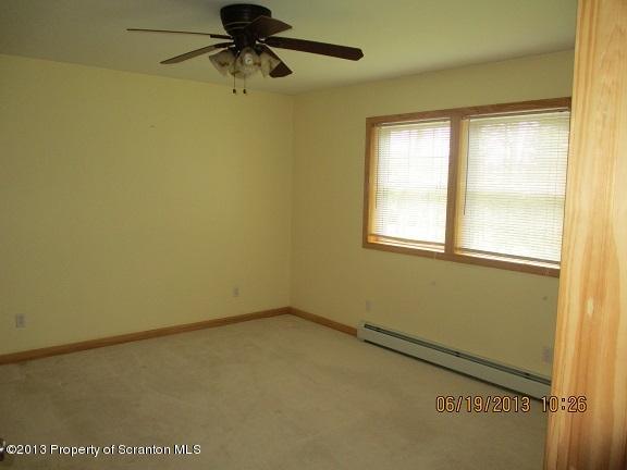 4270 Haas Pond Road Moscow, PA 18444 - Photo 3 of 15 a view of a window in an empty room