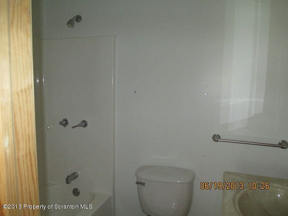 4270 Haas Pond Road Moscow, PA 18444 - Photo 7 of 15 a bathroom with a toilet and shower