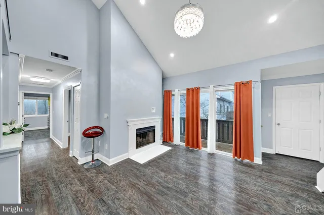 a view of livingroom with furniture wooden floor and window