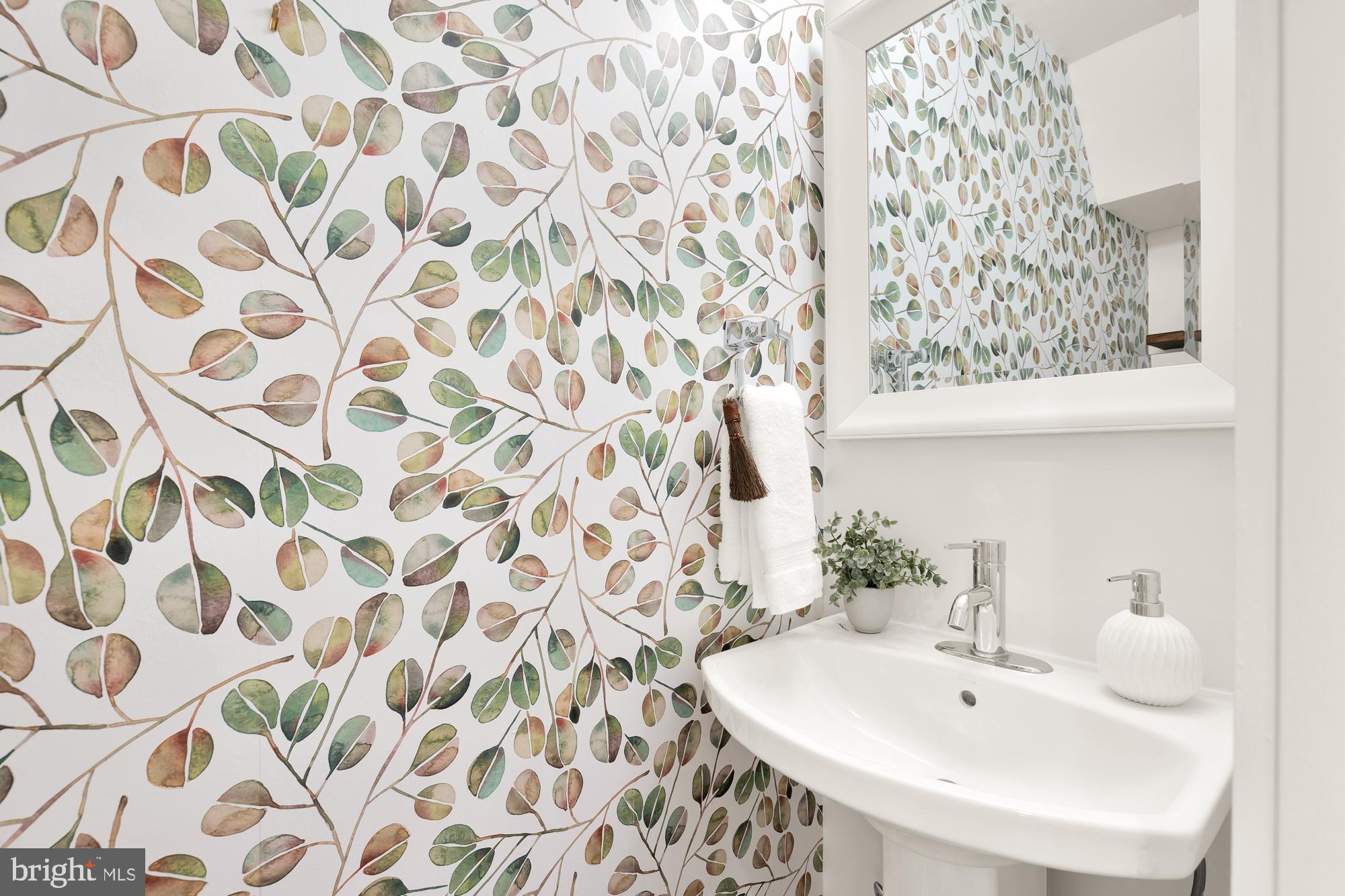 1171 3rd Street Northeast Washington, DC 20002 - Photo 5 of 27 a bathroom with a sink and a mirror