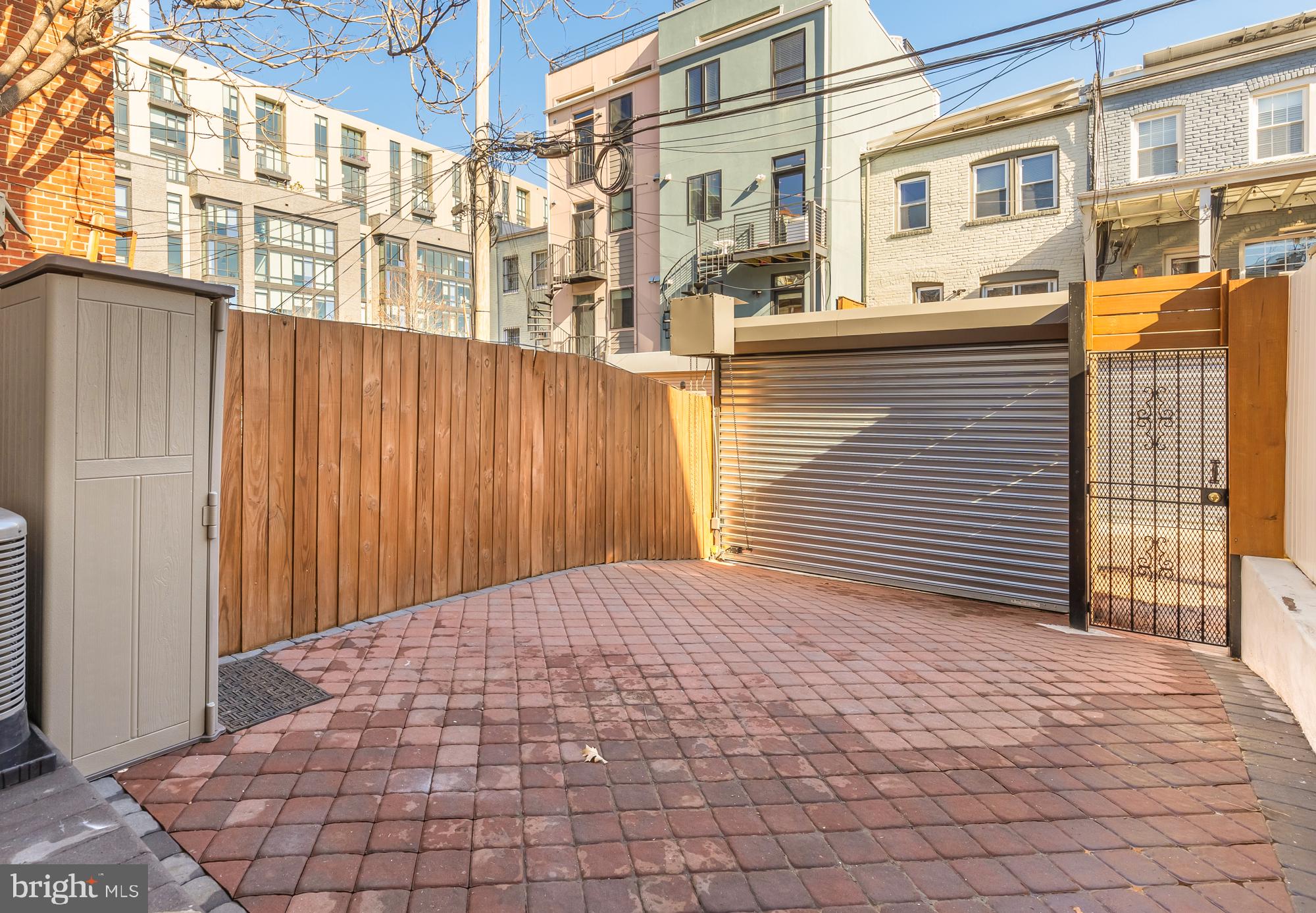 1171 3rd Street Northeast Washington, DC 20002 - Photo 10 of 27 a view of a building with a brick wall