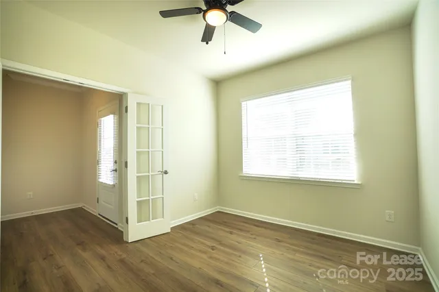 a bathroom with a sink toilet and a mirror