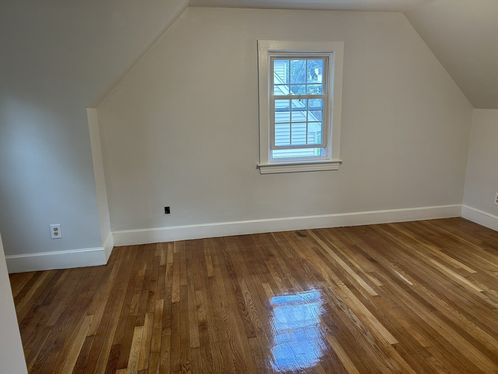 7 Ponkapoag Way Canton, MA 02021 - Photo 7 of 12 a view of wooden floor and cabinet in a room
