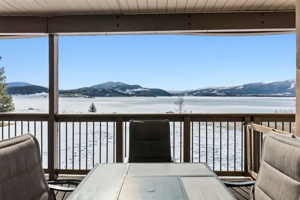 a view of a balcony with lake view and mountain view