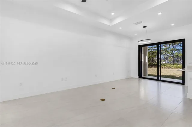 an empty room with sliding door