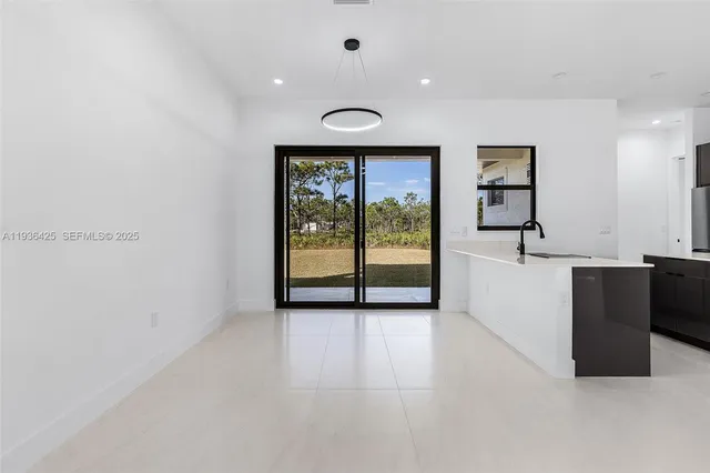 a view of a room with large window