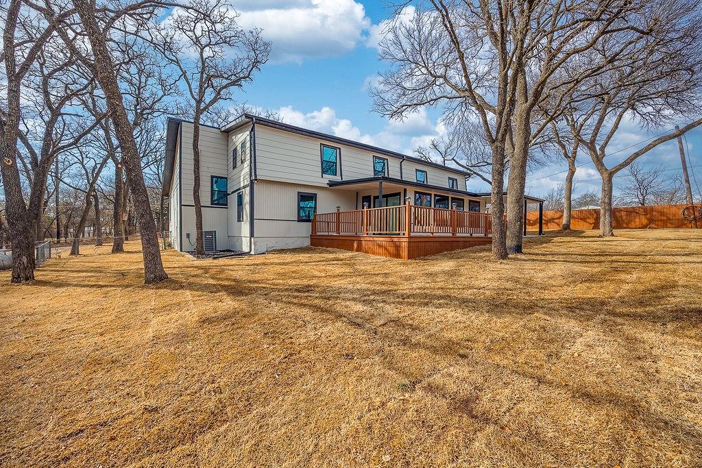 8713 Clay Hibbins Road Keller, TX 76248 - Photo 12 of 40 a view of a houses with snow on the road