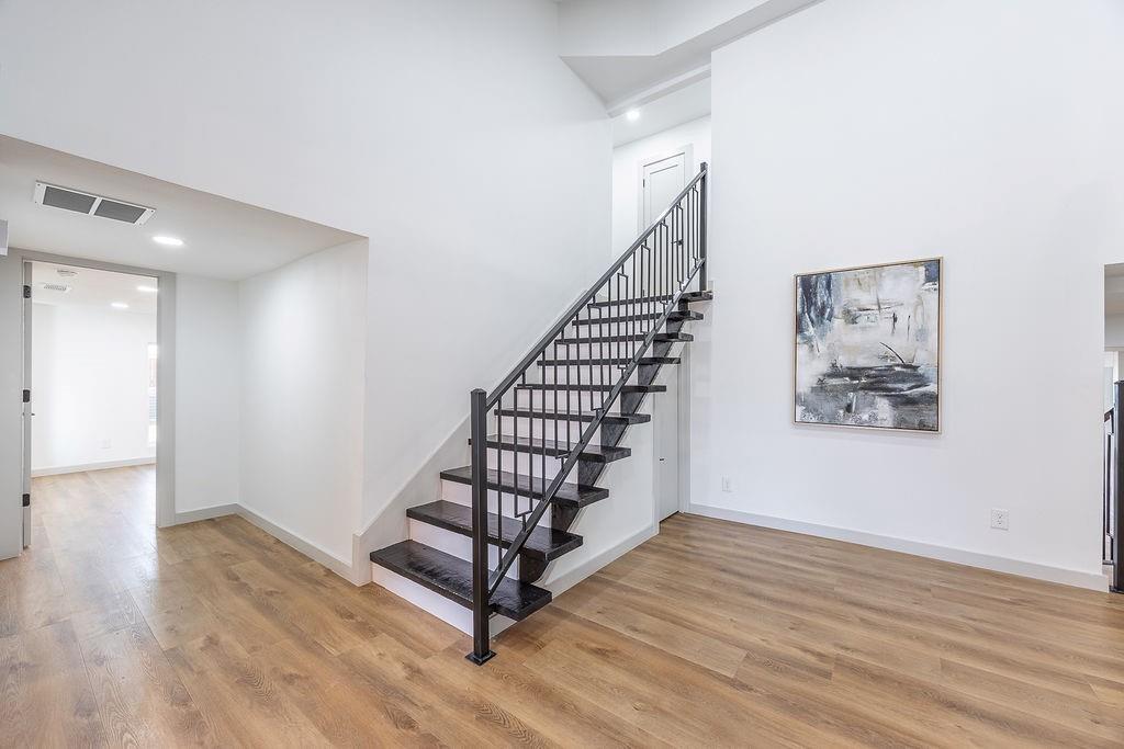 8713 Clay Hibbins Road Keller, TX 76248 - Photo 15 of 40 a view of entryway with wooden floor