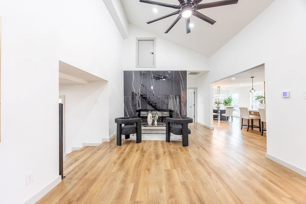 8713 Clay Hibbins Road Keller, TX 76248 - Photo 17 of 40 a living room with furniture and wooden floor