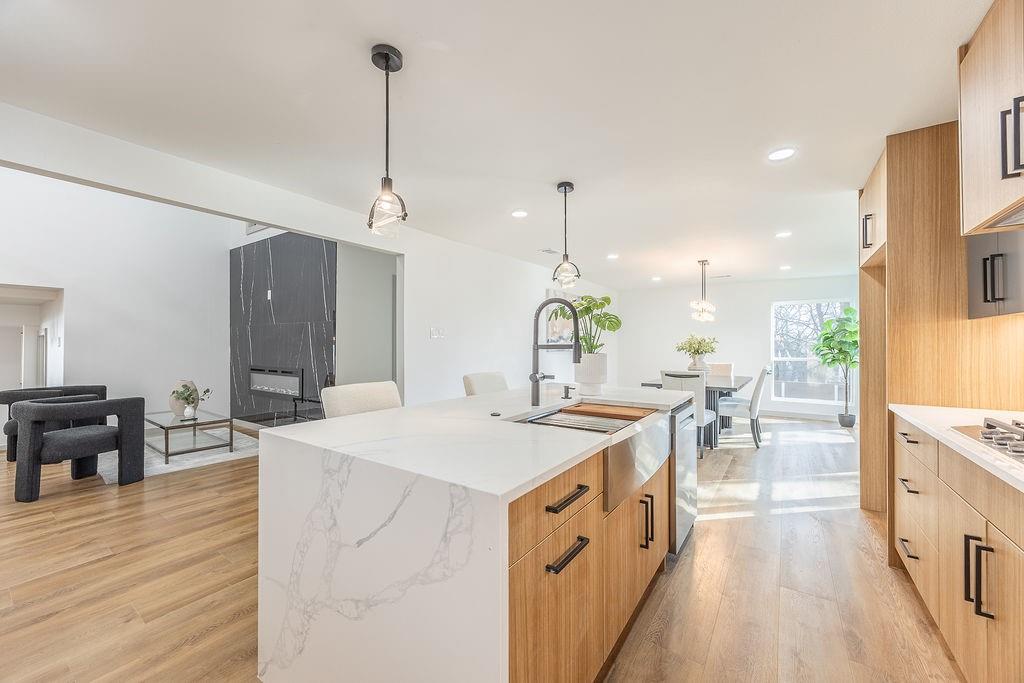 8713 Clay Hibbins Road Keller, TX 76248 - Photo 29 of 40 a open kitchen with stainless steel appliances kitchen island a island in the center
