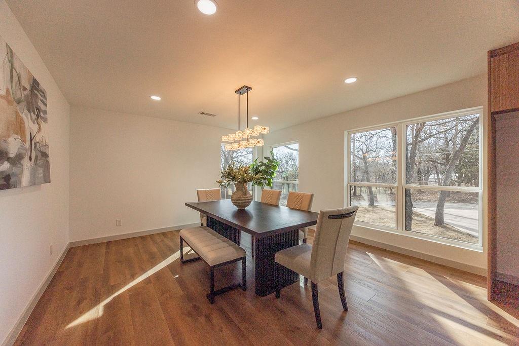 8713 Clay Hibbins Road Keller, TX 76248 - Photo 33 of 40 a dining room with furniture and wooden floor