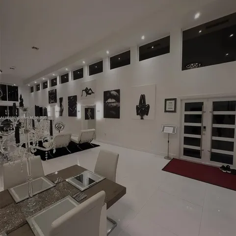 a kitchen with white cabinets