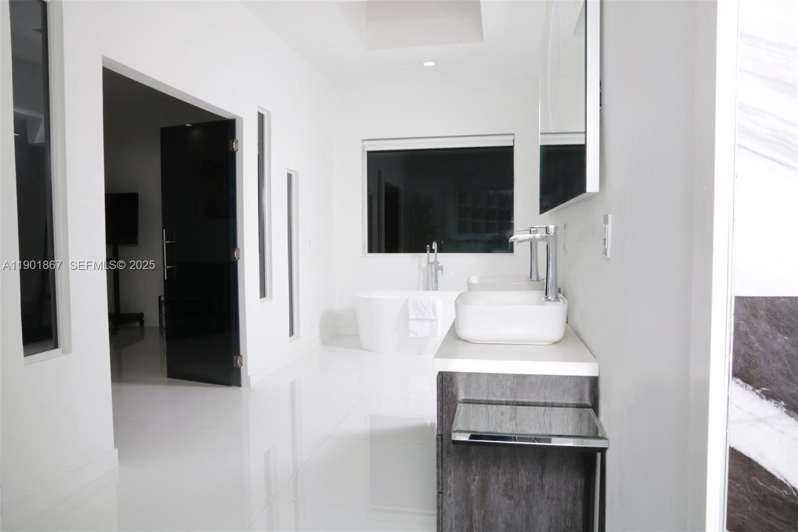 6003 Umbrella Tree Lane Tamarac, FL 33319 - Photo 15 of 22 a view of a living room