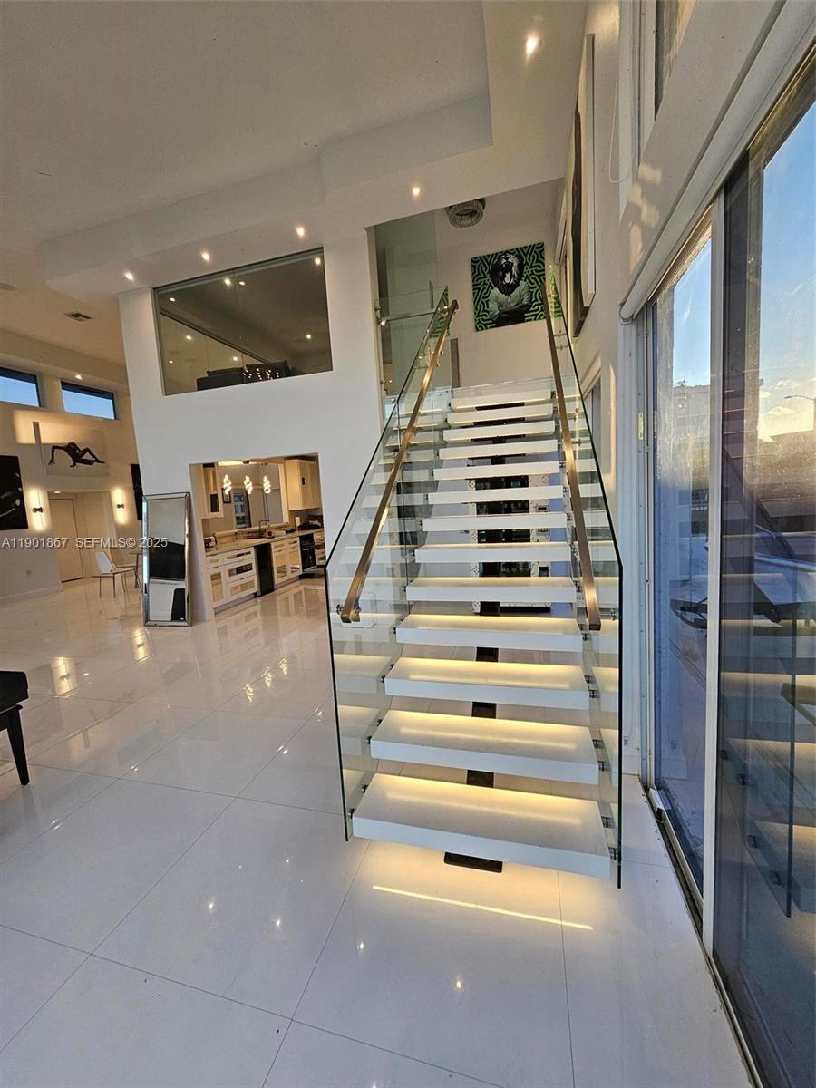 6003 Umbrella Tree Lane Tamarac, FL 33319 - Photo 21 of 22 a view of entryway and hall