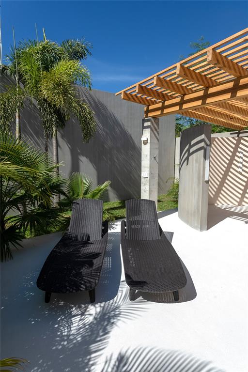 1 Casa Sana Mexico, OUTSIDE OF THE US 70934 - Photo 16 of 36 a view of a chairs and table in the patio