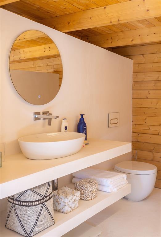 1 Casa Sana Mexico, OUTSIDE OF THE US 70934 - Photo 21 of 36 a bathroom with a sink a mirror and a bathtub