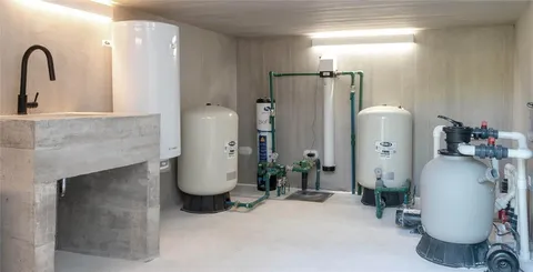 a view of a lobby with furniture and chandelier