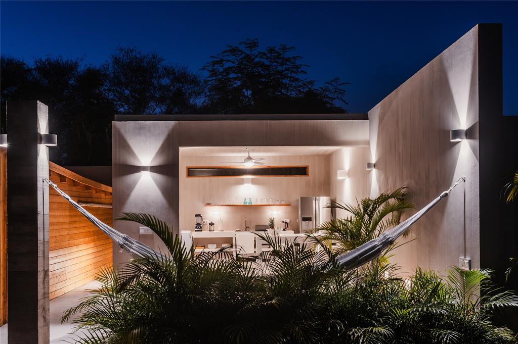 1 Casa Sana Mexico, OUTSIDE OF THE US 70934 - Photo 35 of 36 a front view of a house with garden