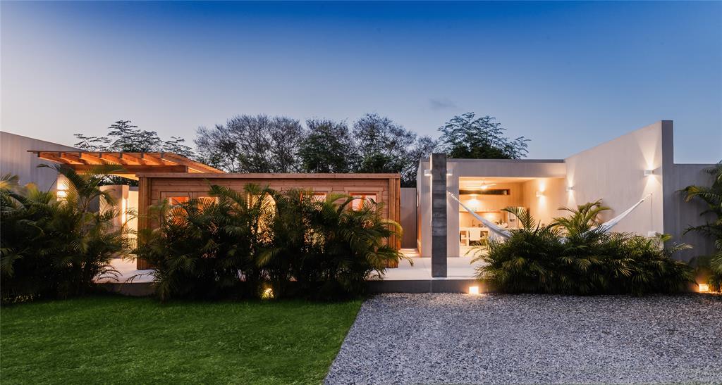 1 Casa Sana Mexico, OUTSIDE OF THE US 70934 - Photo 5 of 36 a front view of a house with garden