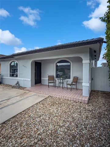 a house view with a outdoor space