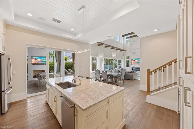a view of living room with granite countertop furniture and fireplace