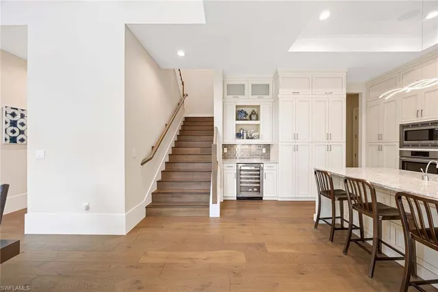 a view of kitchen with furniture and cabinets
