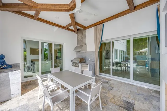 a room with a wooden floor and white walls