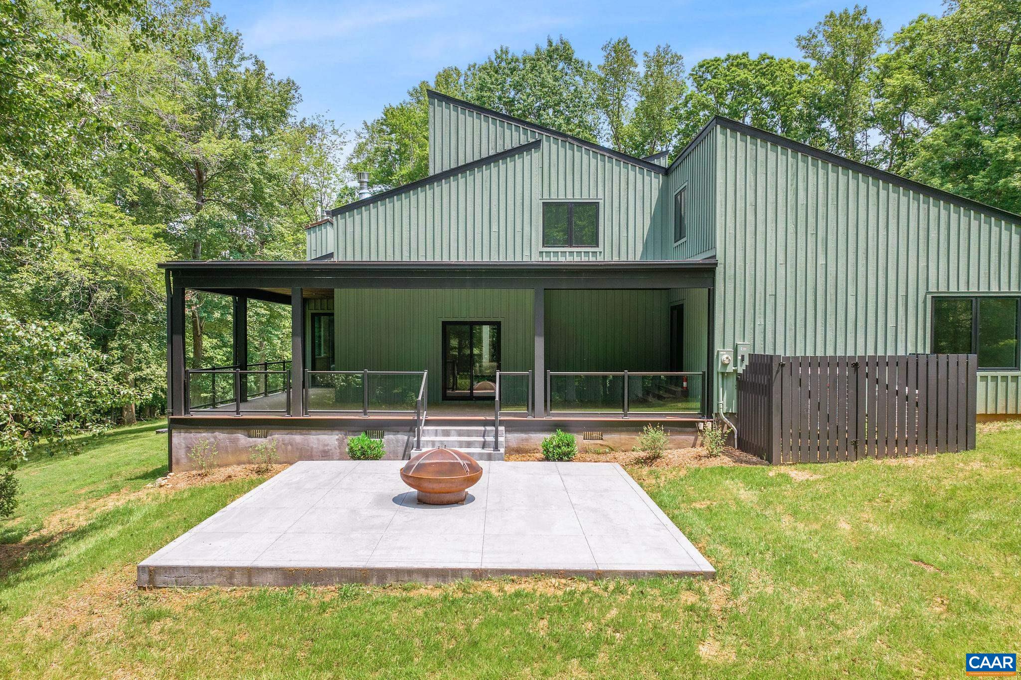 2482 Schelford Farm Road Charlottesville, VA 22901 - Photo 1 of 39 a front view of house with yard outdoor seating and green space