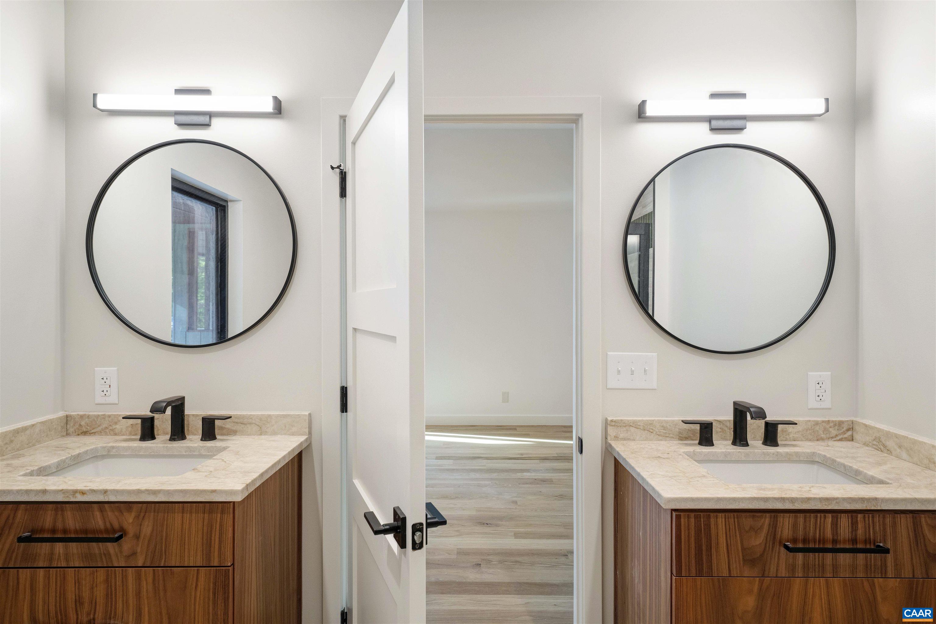 2482 Schelford Farm Road Charlottesville, VA 22901 - Photo 14 of 39 a bathroom with a sink and a mirror