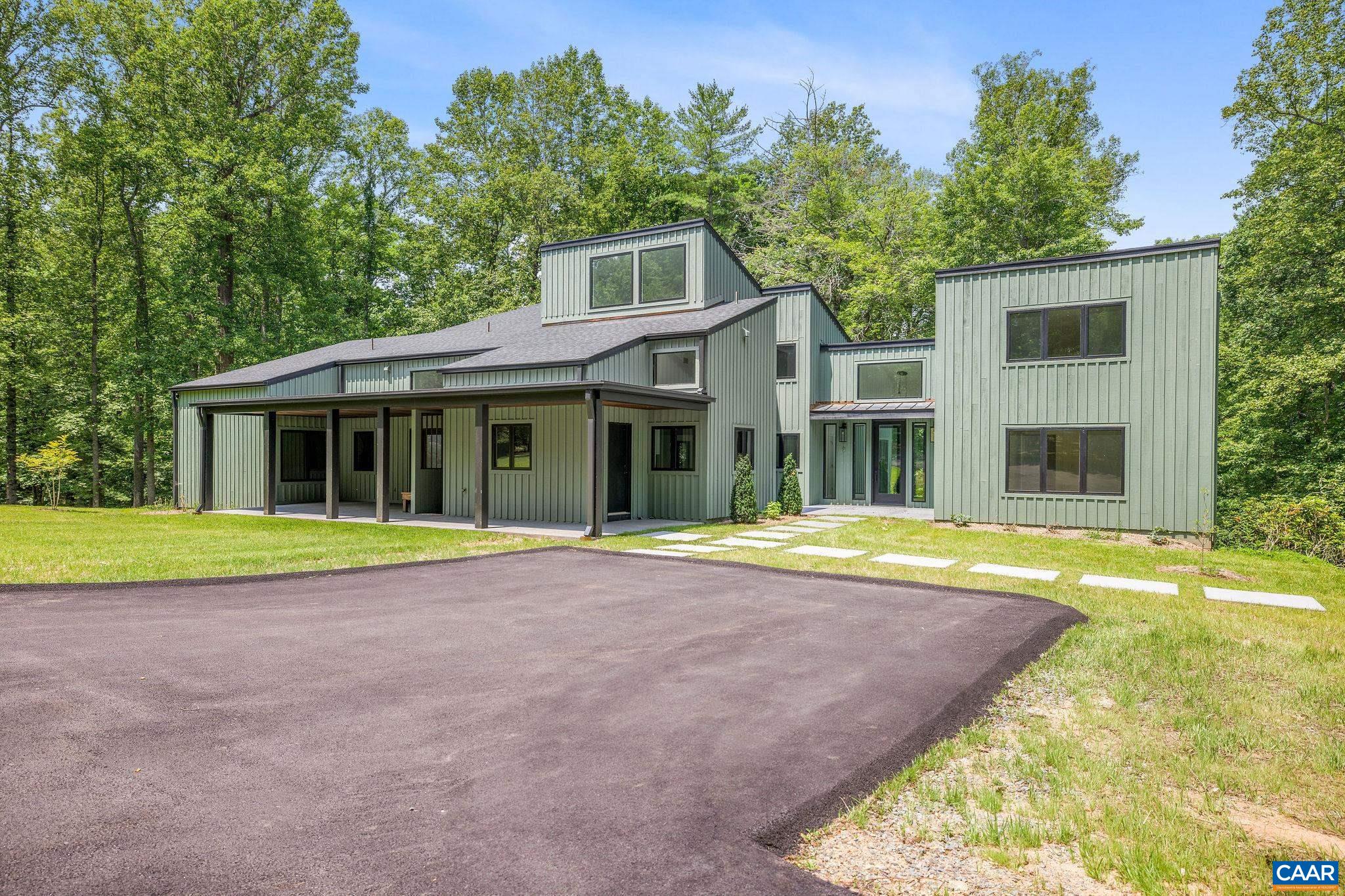 2482 Schelford Farm Road Charlottesville, VA 22901 - Photo 19 of 39 a view of a house with a yard and large tree
