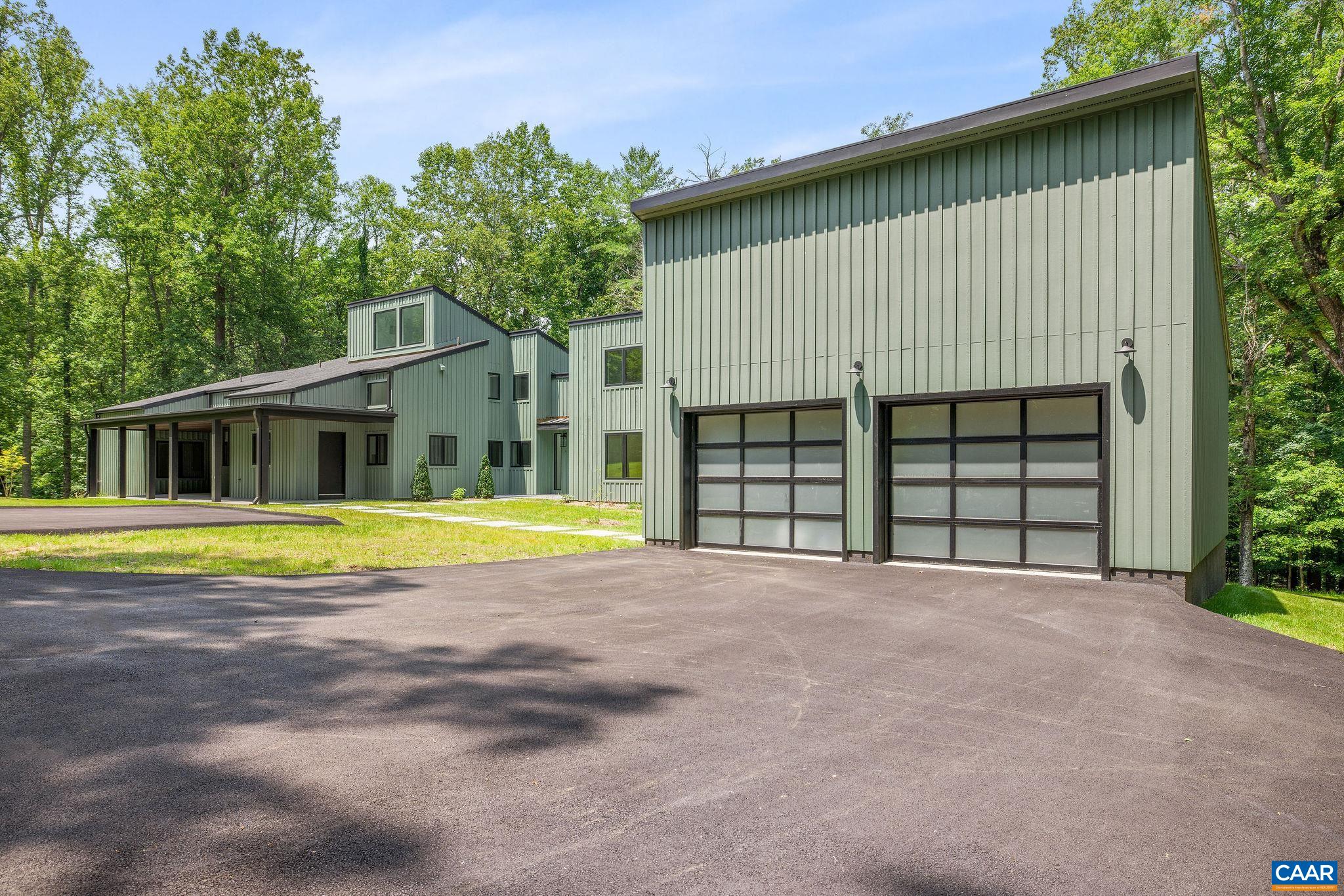 2482 Schelford Farm Road Charlottesville, VA 22901 - Photo 21 of 39 a view of a house with a swimming pool and porch