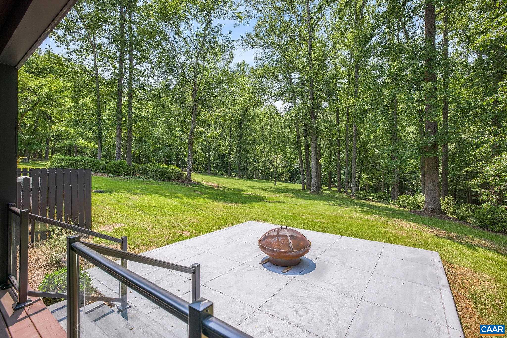 2482 Schelford Farm Road Charlottesville, VA 22901 - Photo 25 of 39 a view of a wooden deck and a yard