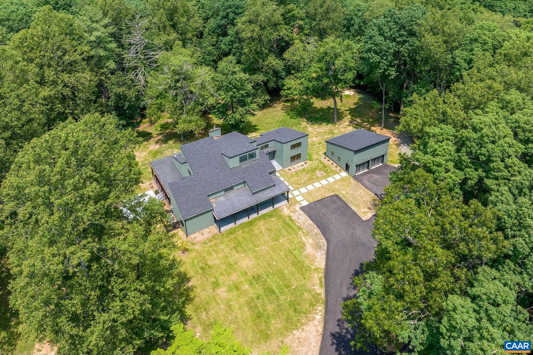 2482 Schelford Farm Road Charlottesville, VA 22901 - Photo 28 of 39 an aerial view of a house with outdoor space and trees all around