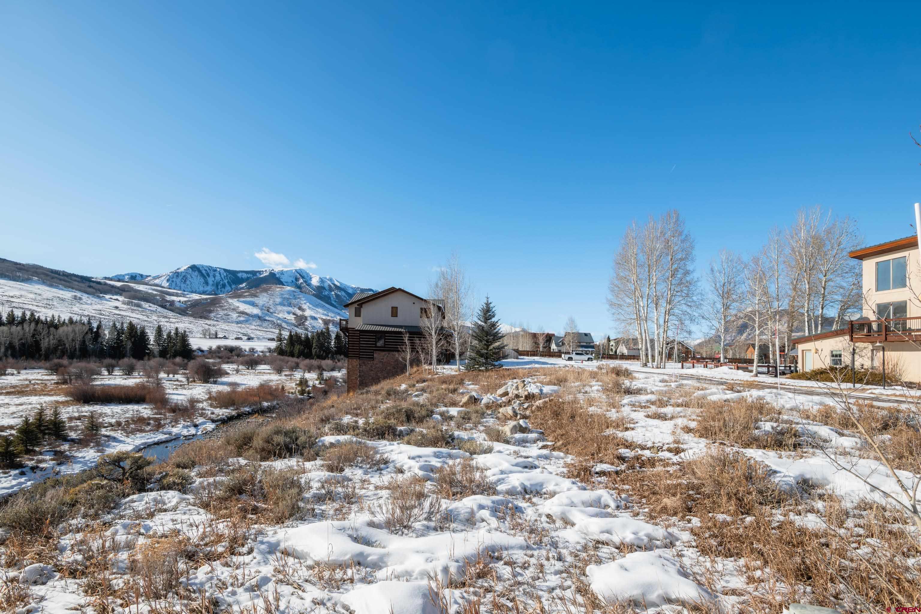 45 Cascadilla Street Crested Butte, CO 81224 - Photo 17 of 25 a view of a town with mountains in the background