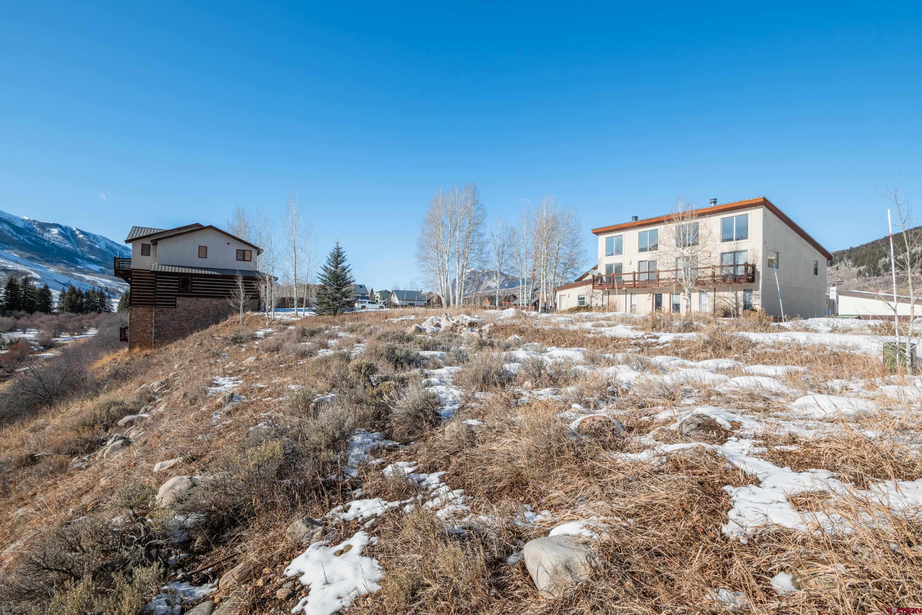 45 Cascadilla Street Crested Butte, CO 81224 - Photo 21 of 25 a view of a house with a snow in the background