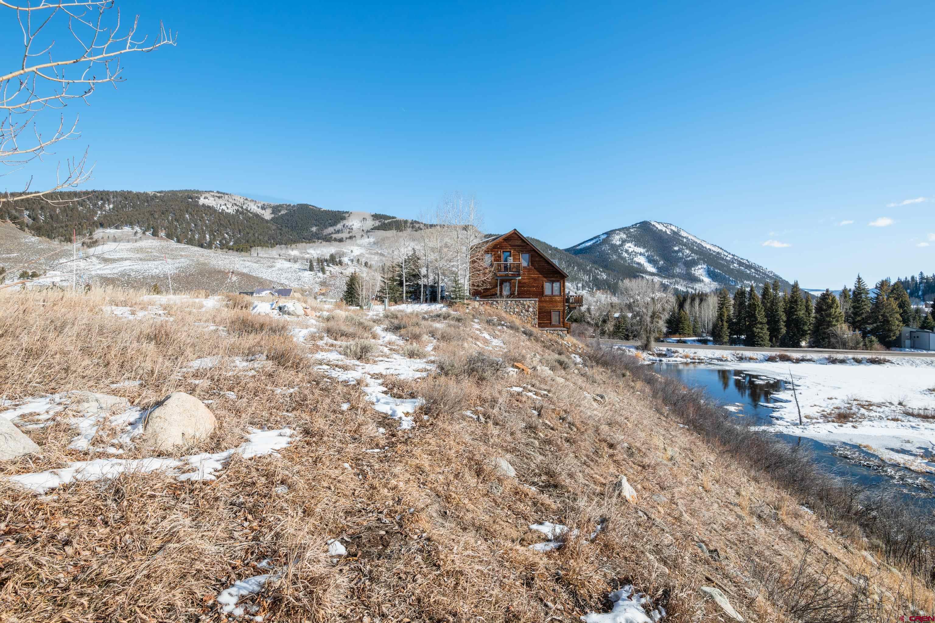 45 Cascadilla Street Crested Butte, CO 81224 - Photo 22 of 25 a view of a dry yard with wooden fence