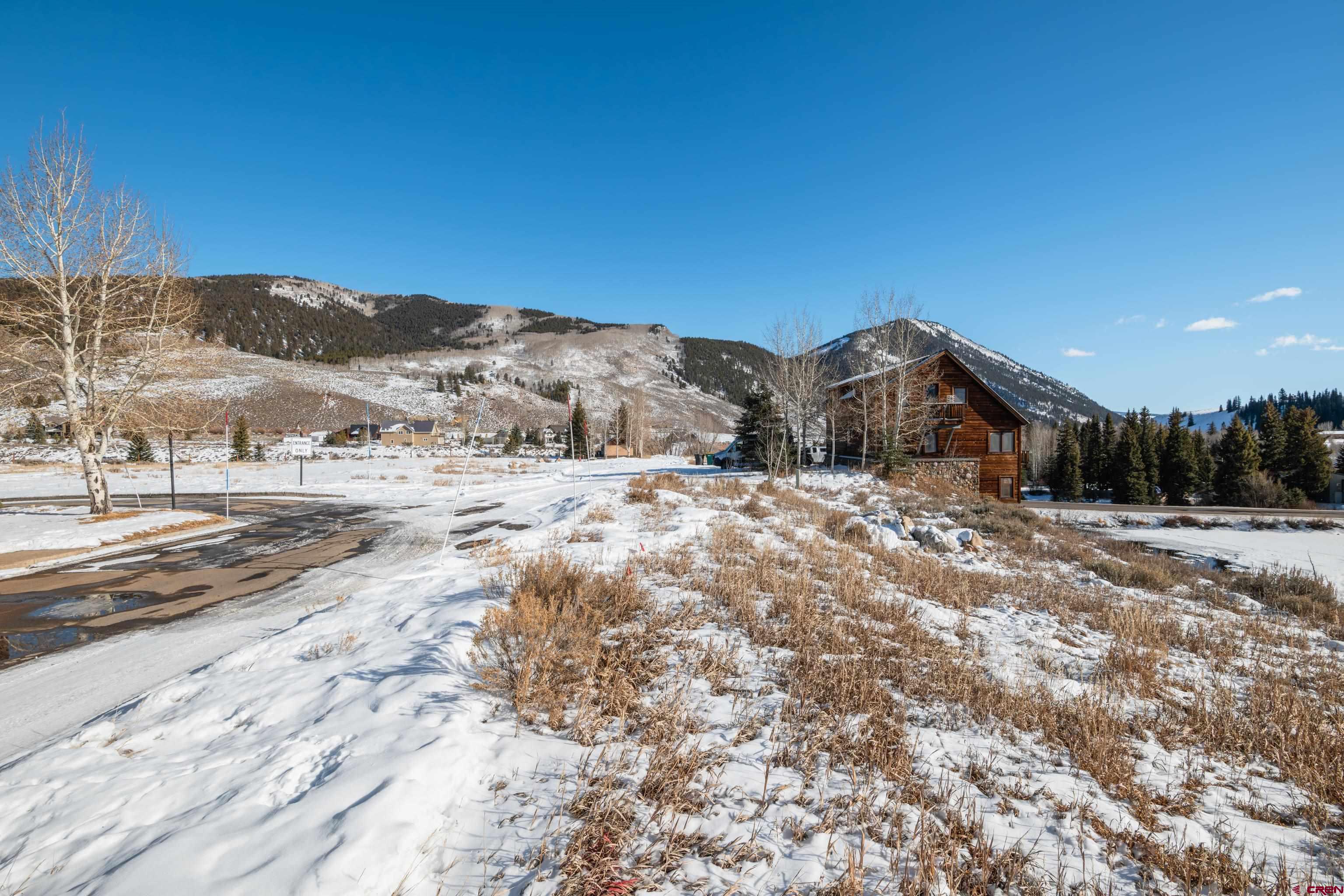 45 Cascadilla Street Crested Butte, CO 81224 - Photo 23 of 25 a view of a dry yard with wooden fence