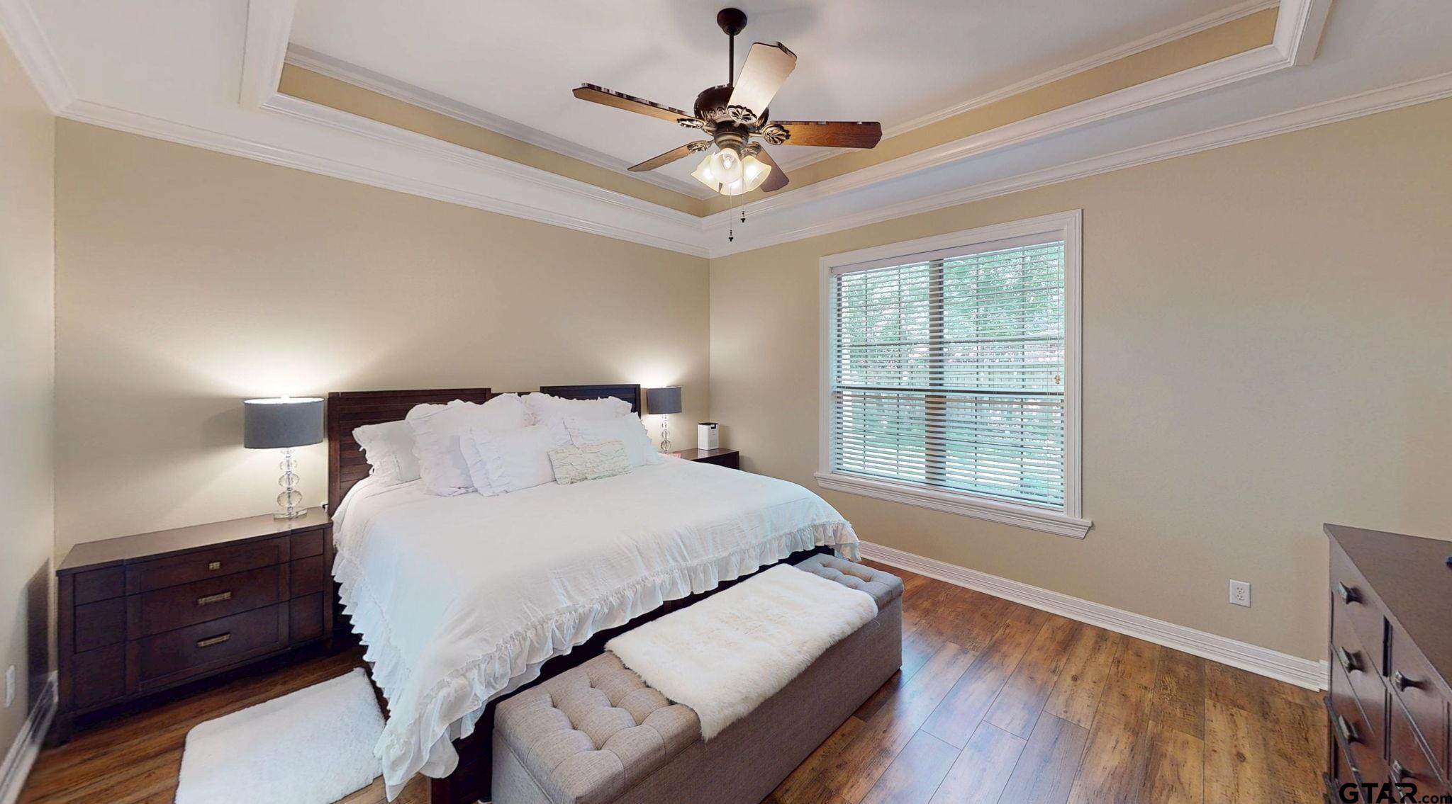 18488 Bluebird Circle Flint, TX 75762 - Photo 18 of 47 a bedroom with a bed dresser and a window