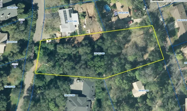 an aerial view of residential house with outdoor space