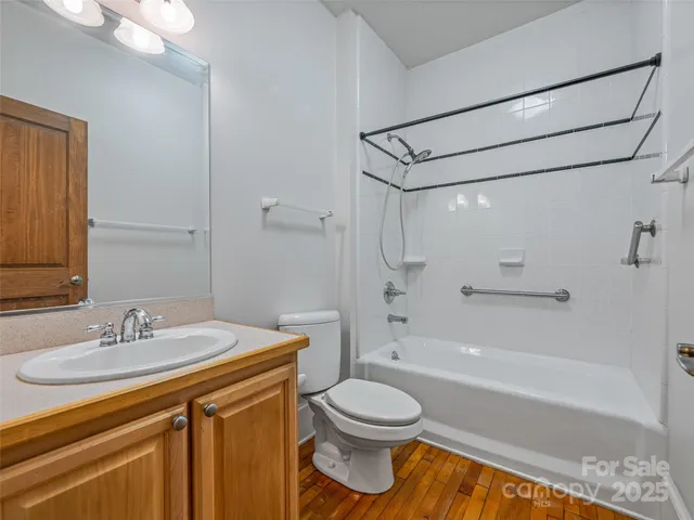 a bathroom with a sink a toilet and a bathtub